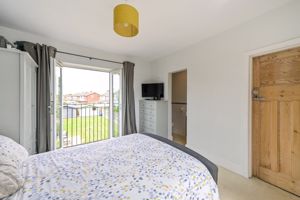 Bedroom One- click for photo gallery